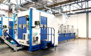CNC milling machine for machining extruded bars