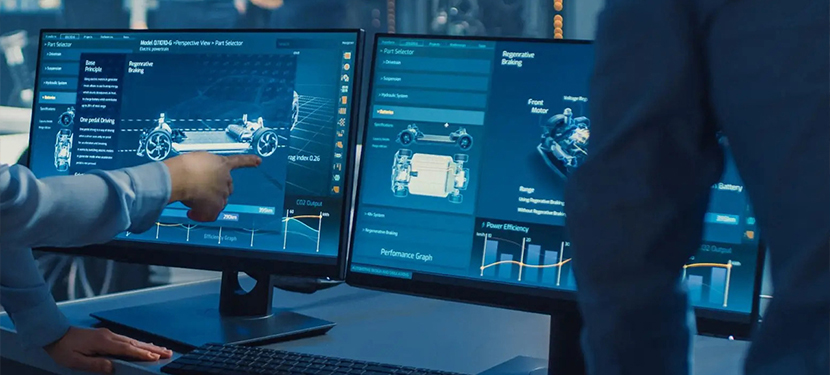 Two computers showing engineering design software.