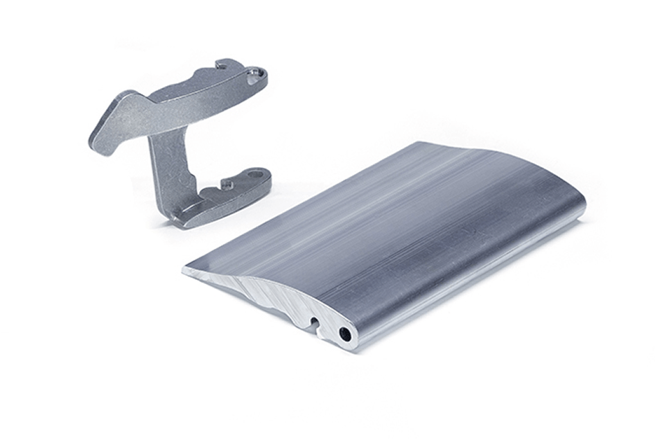 a photograph showing the processing of extruded aluminium bars